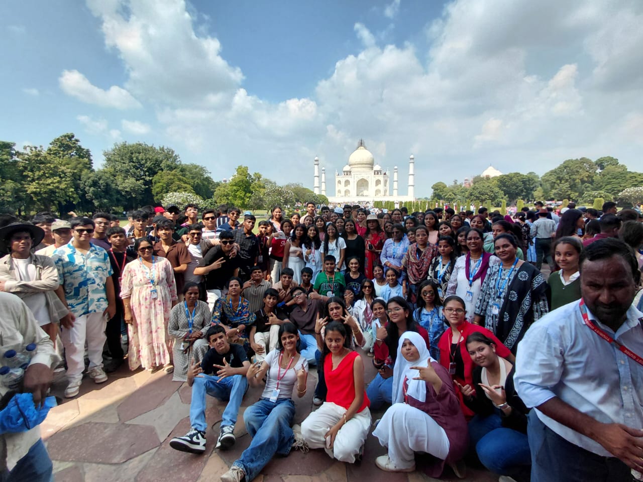 A Shubh Yatra school group posing in front of the Taj Mahal, Agra