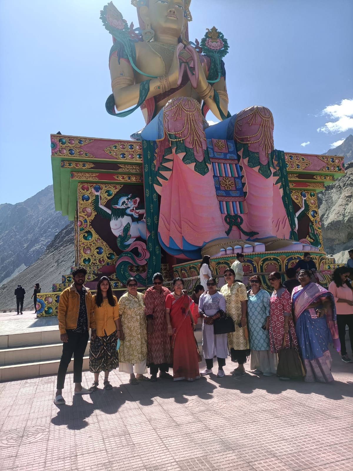 Shubh Yatra travellers at the giant Maitreya Buddha, Diskit Monastery, Nubra Valley