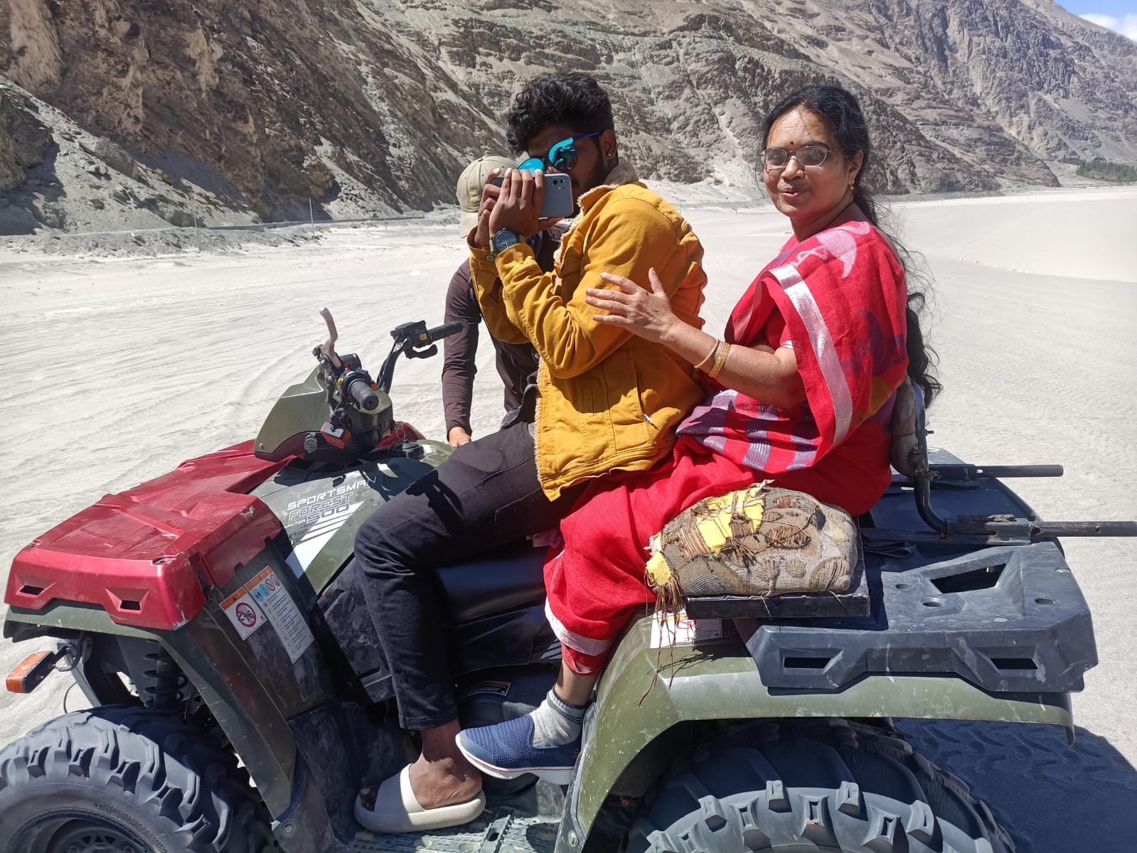 Shubh Yatra travellers on an ATV ride across the Nubra Valley sand dunes